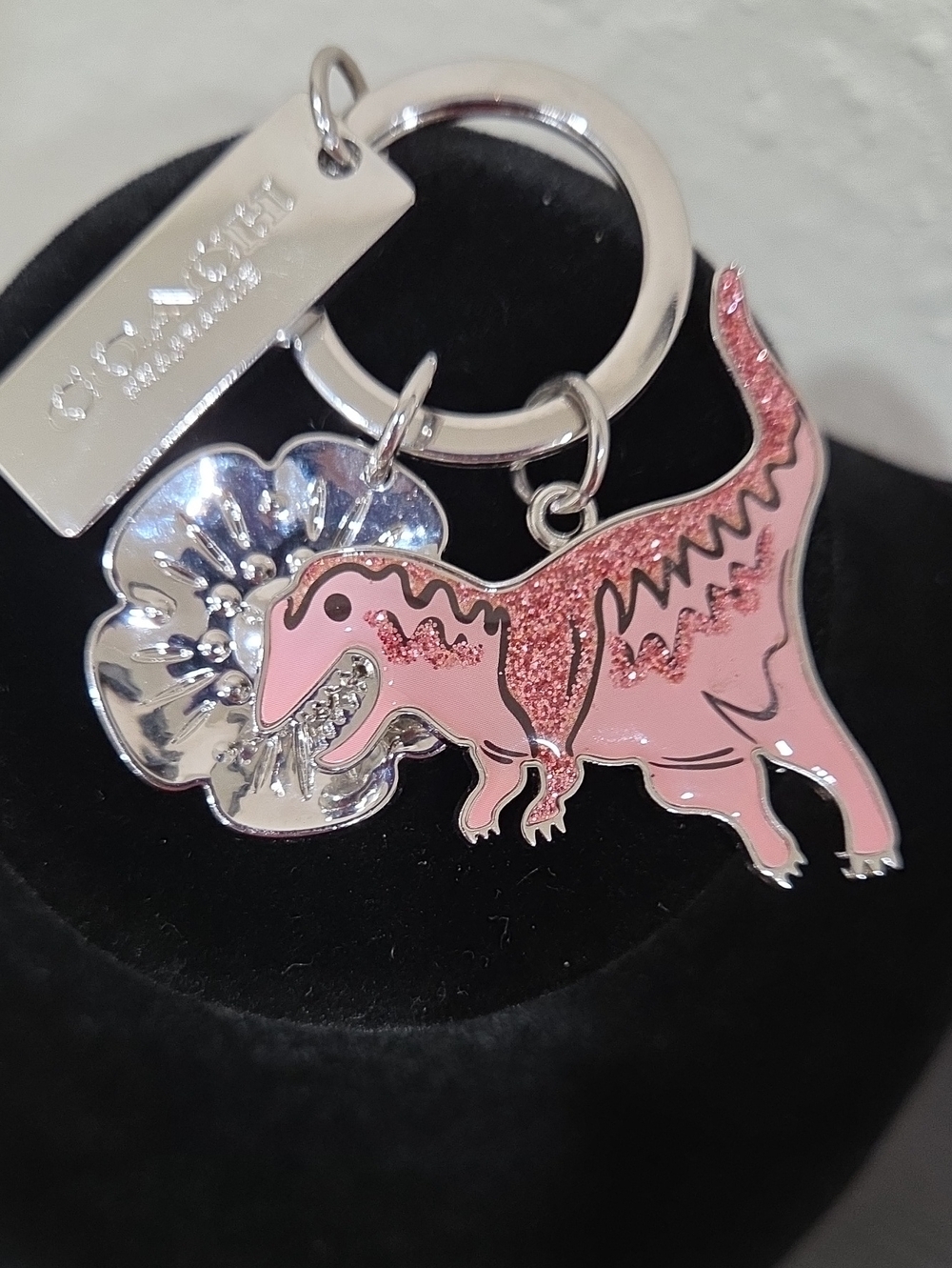 Coach Pink Glitter Dinosaur Key Charm with Silver Flower Tag